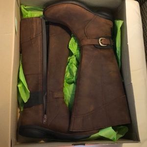 Woman’s knee length leather boots